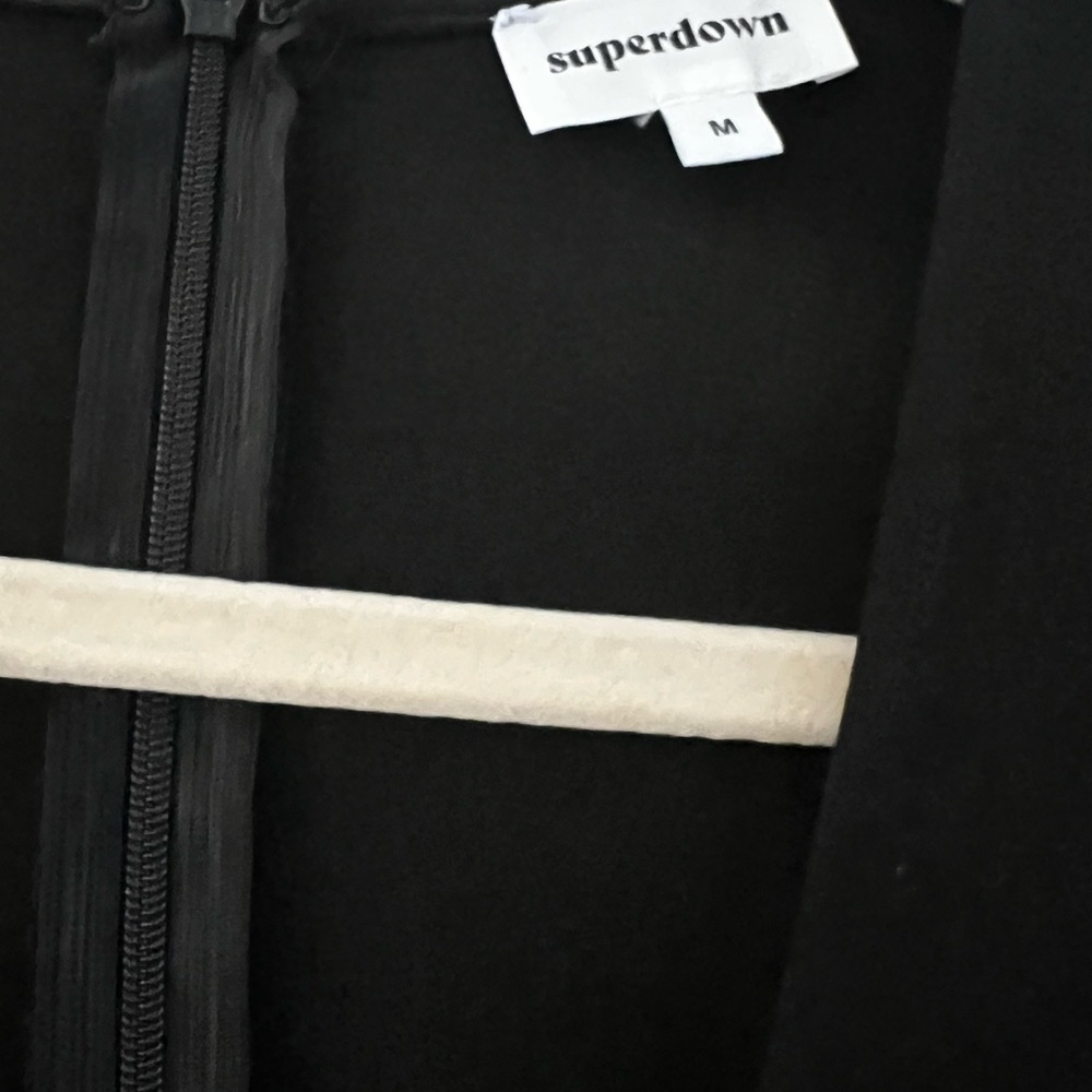 Super down jumpsuit NEVER Worn, with tags , brand new .